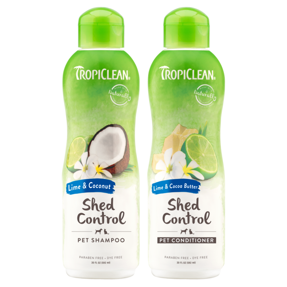 TropiClean Lime & Cocoa Butter Shed Control Pet Grooming 2 Kit. Two bottles of Tropiclean Lime & Coconut Shed Control pet shampoo and conditioner on a white background.
