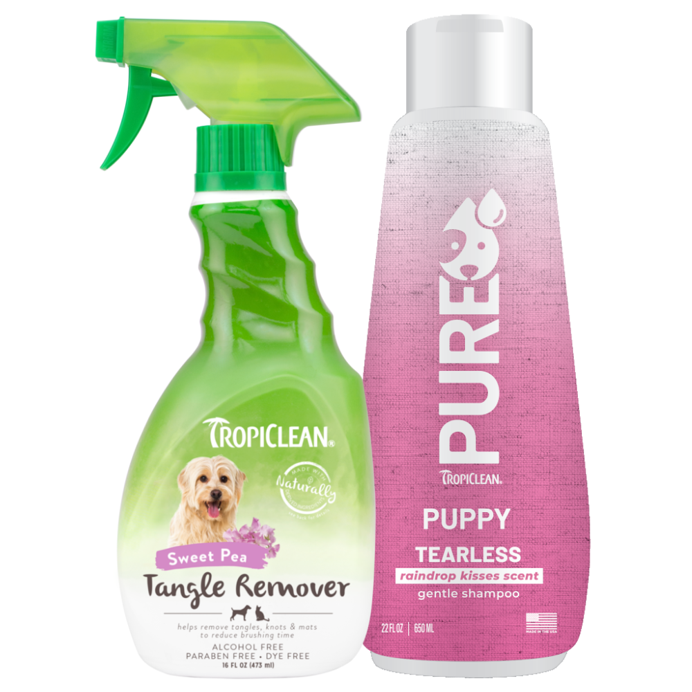 TropiClean Sweet Pea & Raindrop Kisses Gentle Pet Grooming 2 Kit. TropiClean Tangle Remover spray bottle and Puppy Tearless shampoo bottle on a white background