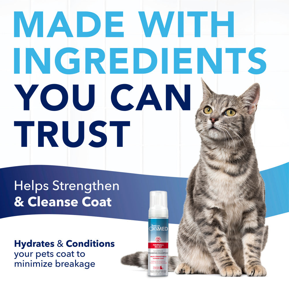 TropiClean OxyMed Waterless Dry Shampoo for Cats. Cat with product and text about trustable ingredients and coat care.