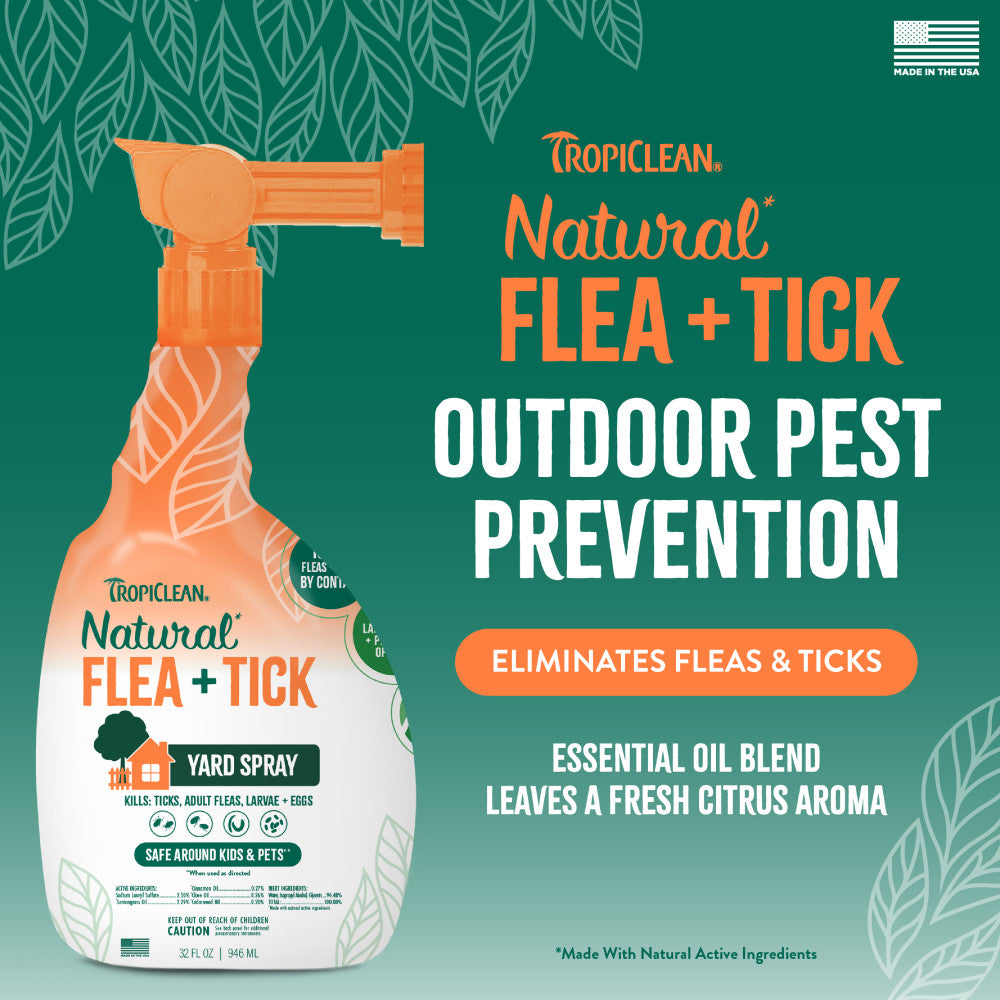 TropiClean Natural Flea + Tick outdoor pest prevention spray bottle on a green background with text.