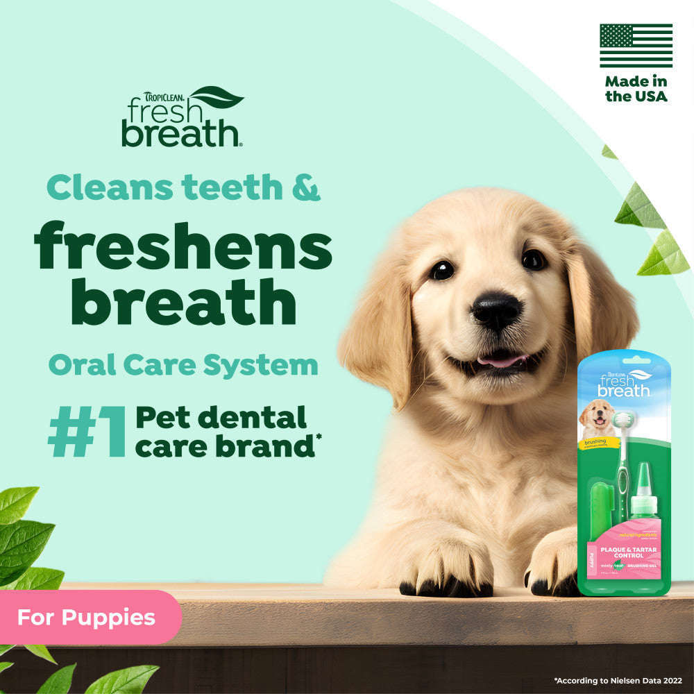 Puppy with TropiClean Fresh Breath Plaque & Tartar Control Kit for Puppies and text about fresh breath for pets, made in the USA.