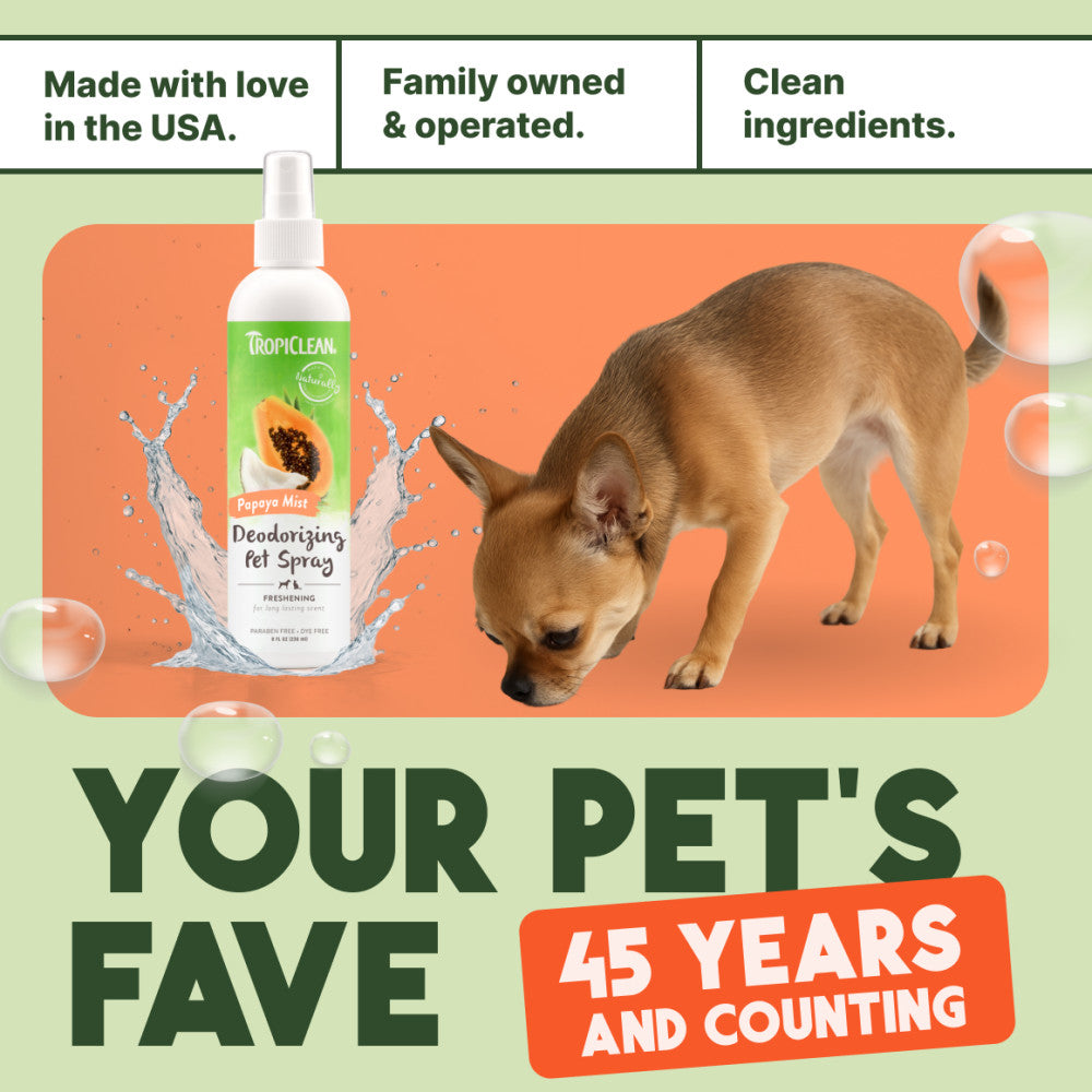 TropiClean Papaya Mist Deodorizing Pet Spray for Dogs & Cats. Spray bottle with a dog sniffing it, with text about the brand's history and values.