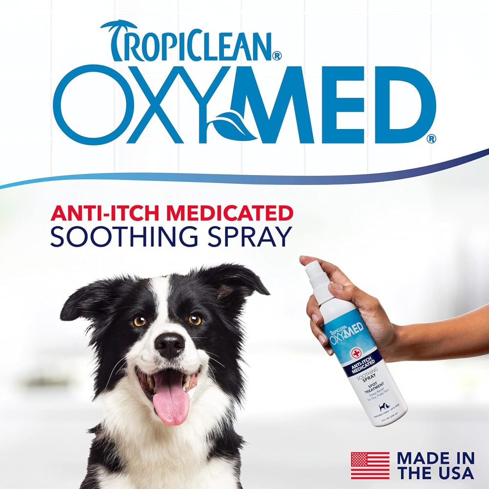 TropiClean OxyMed Medicated Anti-itch Spray for Pets with a dog and person holding the spray bottle on a white background.
