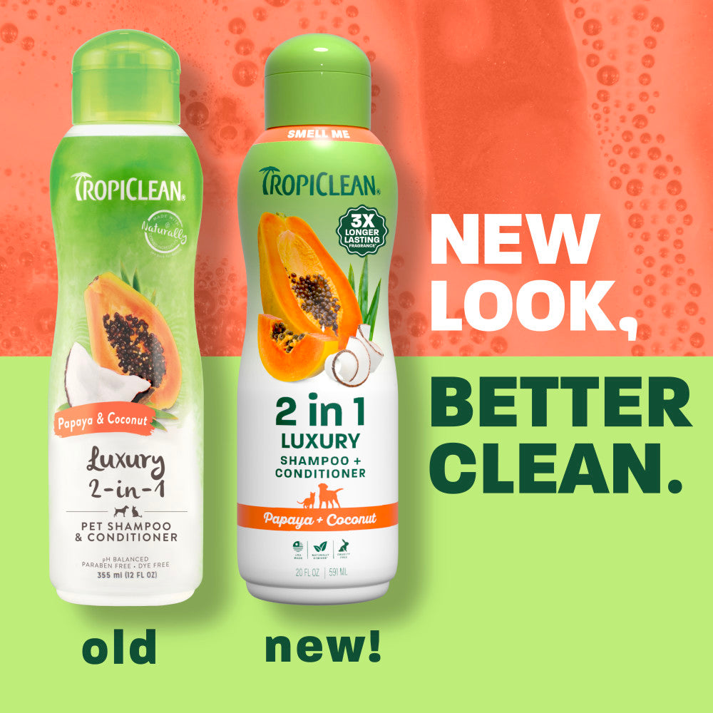Two bottles of TropicClean pet shampoo and conditioner with a colorful background and text indicating a new look.