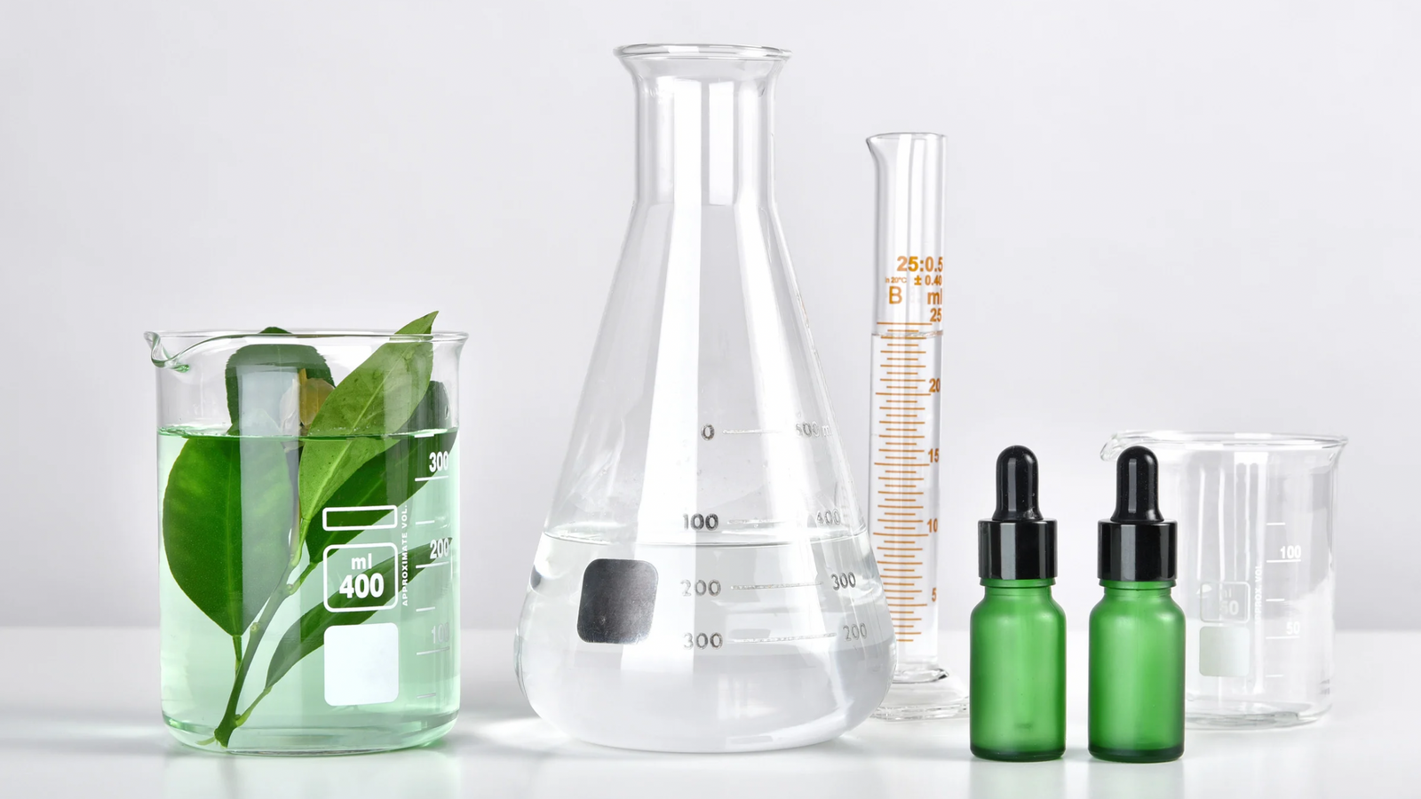 Image of product ingredients in test tubes and beakers.