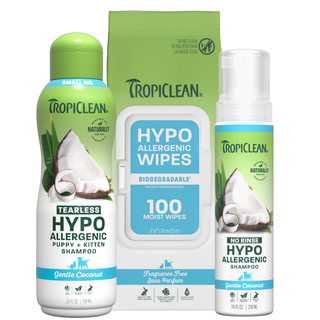 Tropiclean pet care products including shampoo, wipes, and no-rinse shampoo on a white background