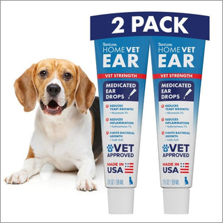 Two tubes of TropiClean HomeVet medicated ear drops displayed next to a brown and white dog.