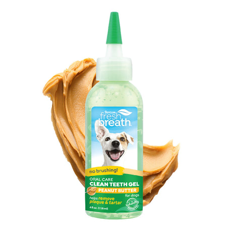 Dog tooth gel bottle with peanut butter on a white background