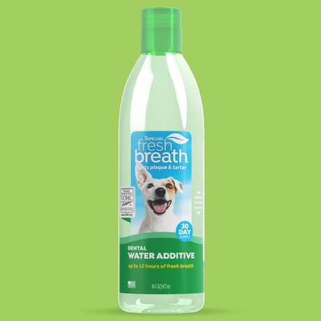 TropiClean Fresh Breath Dental Water Additive for Pets, image of bottle on a green background