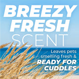 TropiClean PURE Breezy Fresh Deluxe 2-in-1 Plant-Based Dog Shampoo and Conditioner, advertisement with text 'Breezy Fresh Scent' and beach scene.