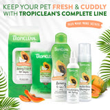 Tropiclean pet care products including shampoo, wipes, and sprays with tropical fruits on a white background.