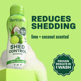 TropiClean shed shampoo bottle on light green background.