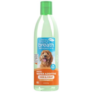 TropiClean Fresh Breath Dental Pet Water Additive with Skin and Coat additive. Bottle on a white background.