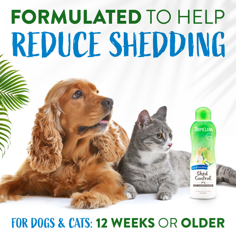 Dog and cat with a bottle of TropiClean Lime & Cocoa Butter Shed Control Conditioner for Pets