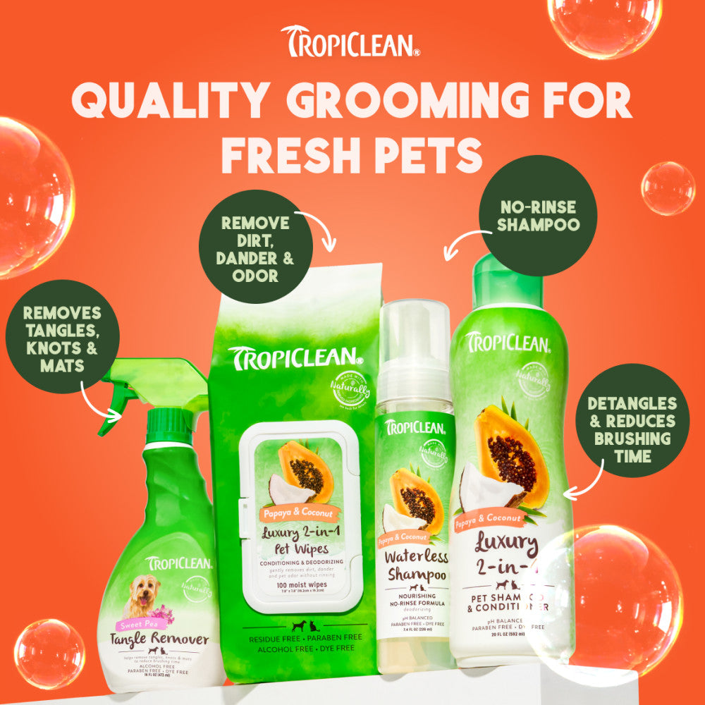 TropiClean pet grooming products on an orange background with product features highlighted.