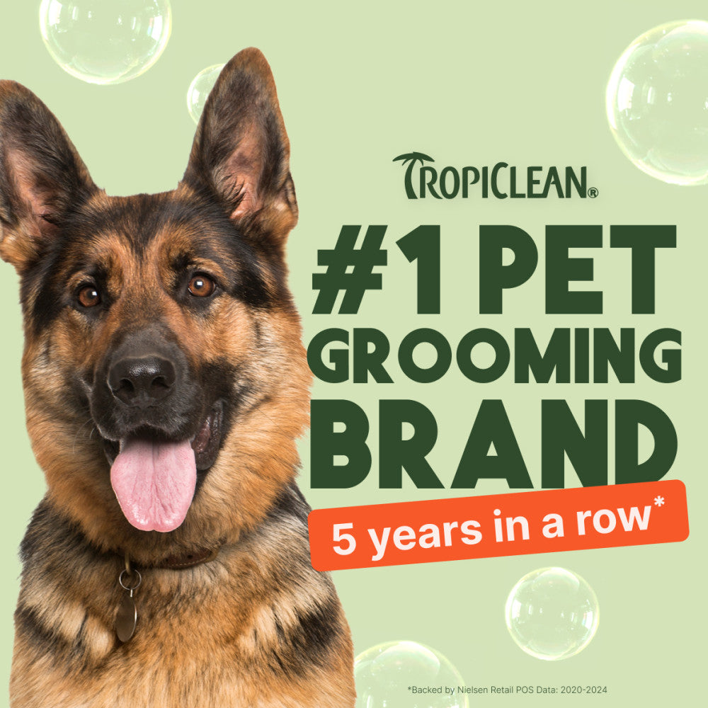 Dog with Tropiclean branding claiming to be #1 pet grooming brand for 5 years in a row.