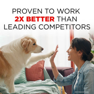Woman giving a dog a high-five with text claiming effectiveness over competitors of TropiClean Skunk Odor Control Shampoo for Dogs & Cats.