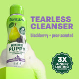 TropiClean blackberry shampoo bottle on light green background.