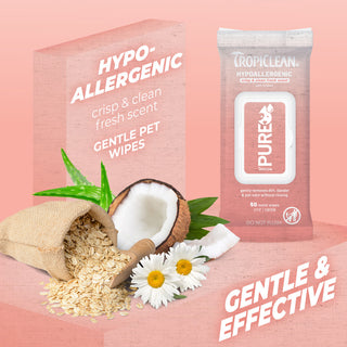 TropiClean PURE Hypoallergenic Plant-Based Wipes for Dogs & Cats package with coconut, oats, and daisies on a pink background