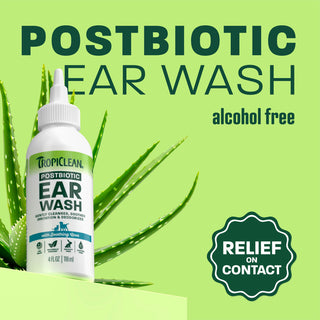 TropiClean ear wash bottle on light green background.