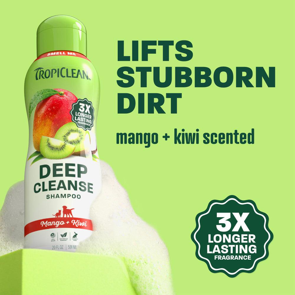 TropiClean mango kiwi shampoo bottle on light green background.