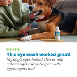Dog lying on with a bottle of eye wash and a person sitting next to it, with a testimonial about the eye wash's effectiveness.