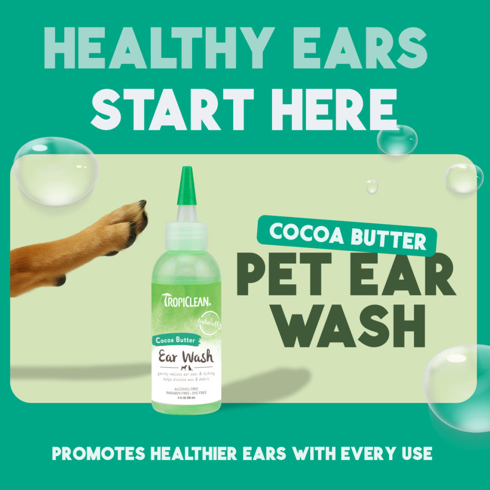 Tropiclean Cocoa Butter Pet Ear Wash bottle with promotional text on a green background