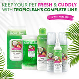 Tropiclean pet care products including shampoo, wipes, and sprays with leafy green background.