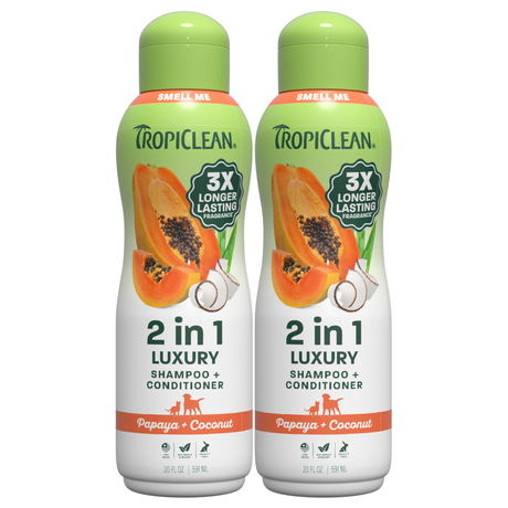Two bottles of TropiClean 2 in 1 Luxury Shampoo and Conditioner in papaya and coconut scent, 20 fl oz each.