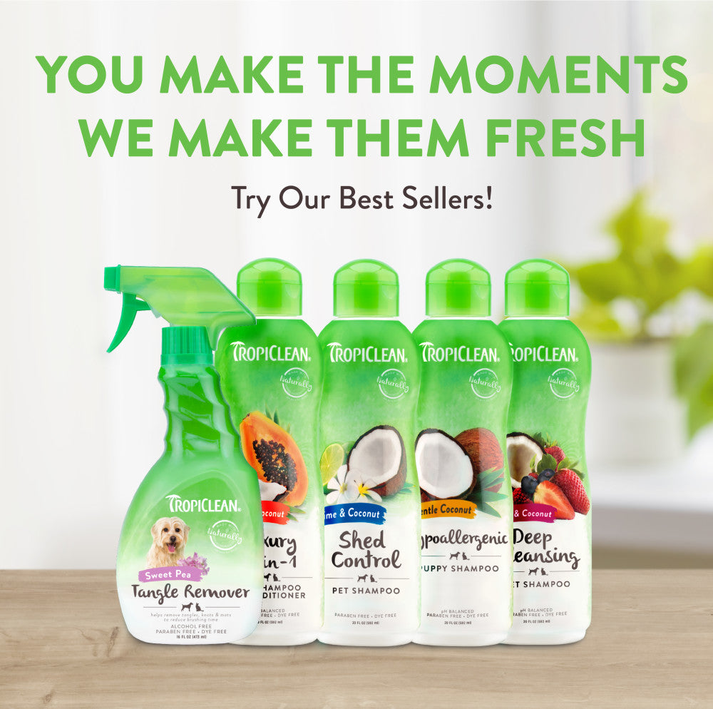 Tropiclean pet care products on a wooden surface with promotional text.