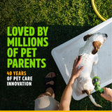 Person washing a dog with text about TropiClean pet care innovation on a grassy background