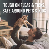 TropiClean Natural Flea + Tick Gentle Cat Shampoo. Man playing with a cat on a couch with text about product effectiveness