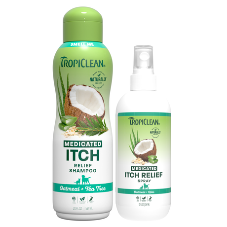 Two TropiClean medicated itch relief pet products: a 20oz green and white shampoo bottle with oatmeal and tea tree, and a 12o