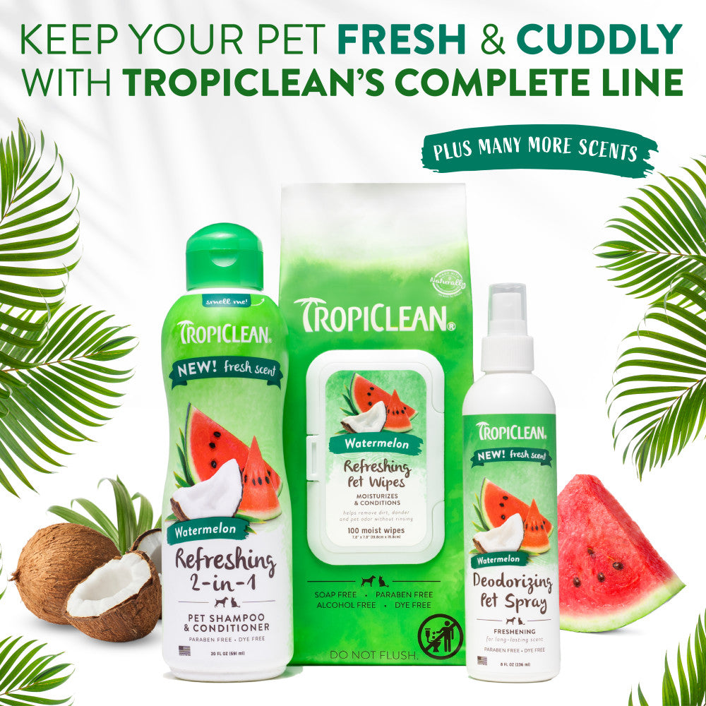 Tropiclean pet care products with watermelon flavor on a white background with green leaves.