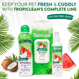 Tropiclean pet care products with watermelon flavor on a white background with green leaves.