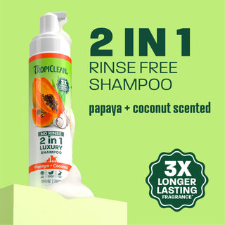 TropiClean waterless papaya shampoo bottle on light green background.