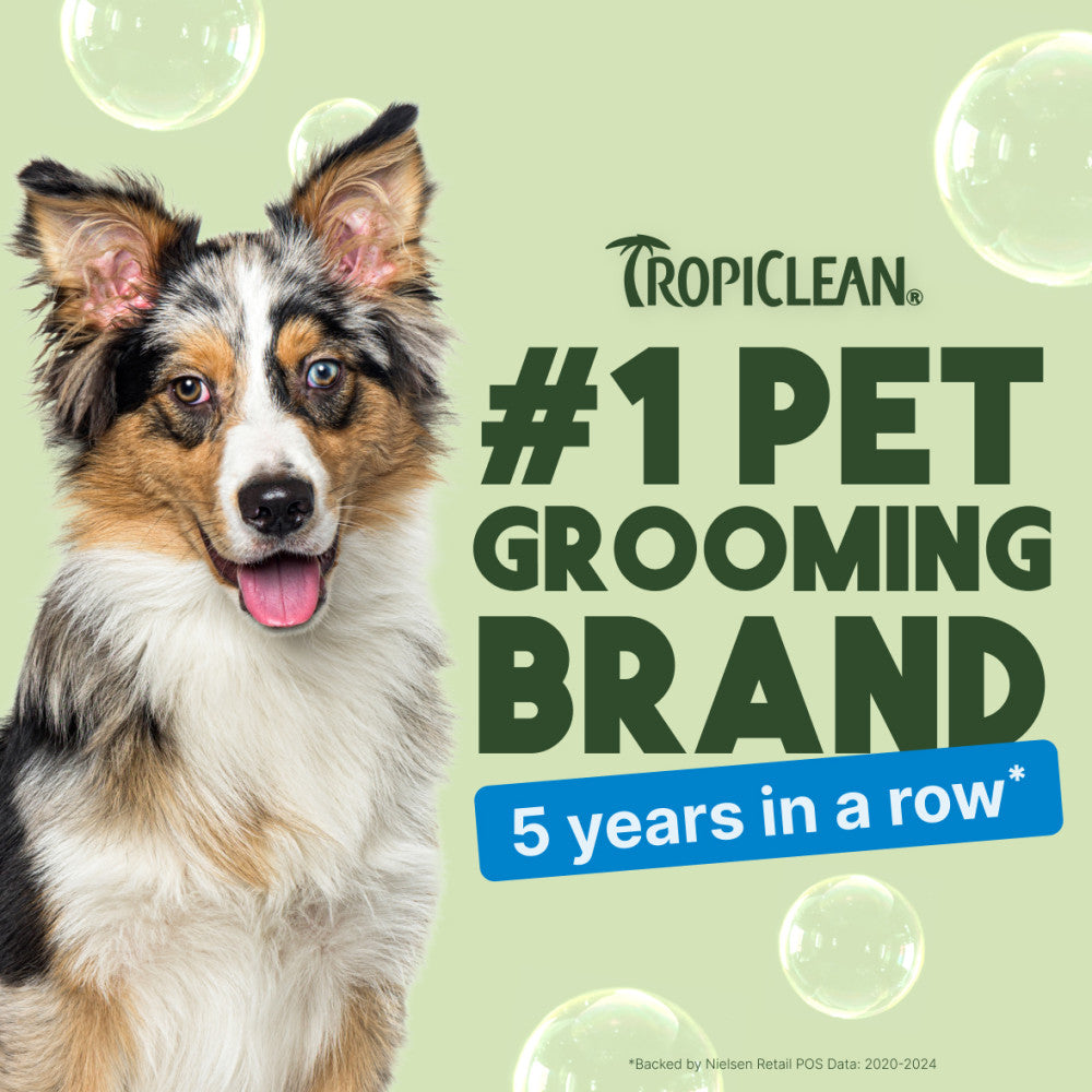 TropiClean advertisement with a dog on a light green background stating it's the #1 pet grooming brand
